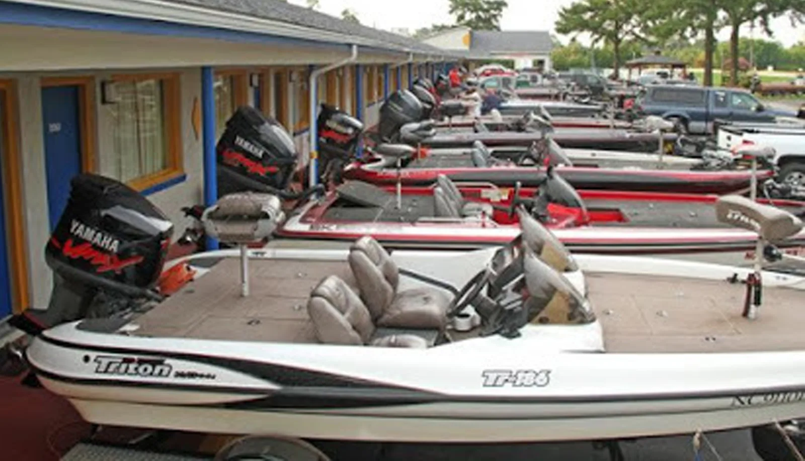 Fleet of fishing boats with Yamaha motors docked at Sportsman Inn